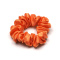 Haargummi aus Seide orange