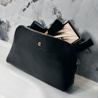 Skórzana damska kosmetyczka z bursztynem