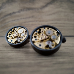 Titanium cufflinks with watch movement