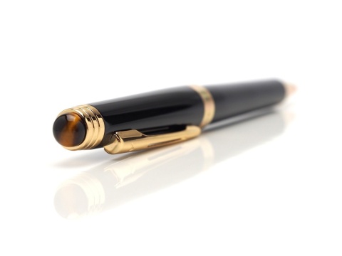 Złoty długopis z tygrysim okiem