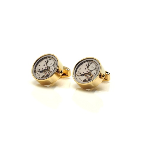 cufflinks with gold watch mechanism