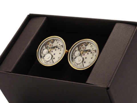 cufflinks with gold watch mechanism